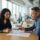 Employee and manager reviewing performance records after the employee used FMLA leave.