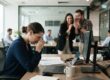 Employee experiencing workplace gossip and social exclusion that may involve harassment or discrimination.